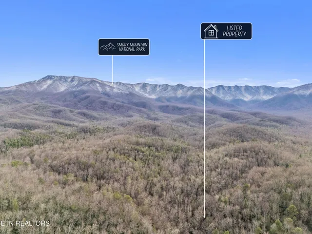 a backyard of a house with bicycles parked