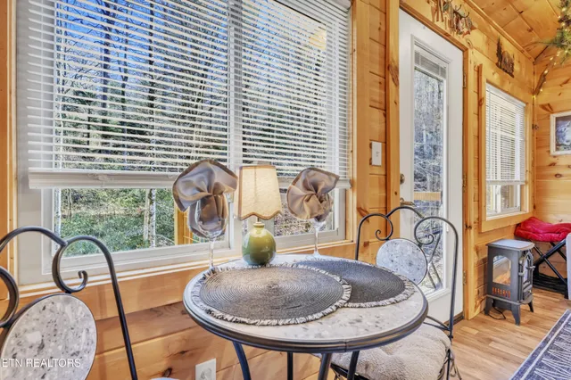 a living room with furniture and window