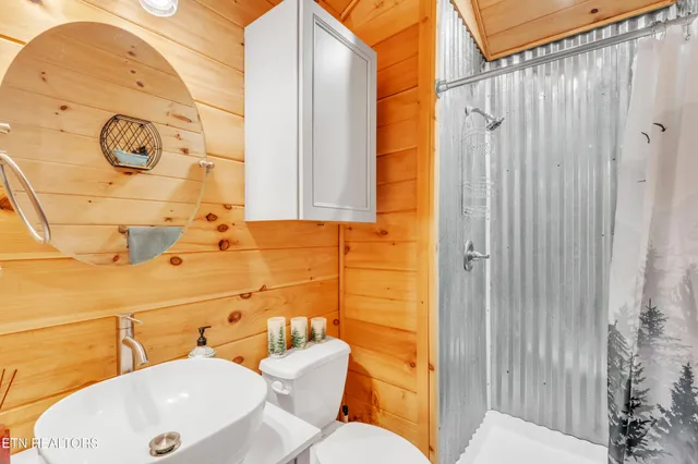 a bathroom with a toilet and sink