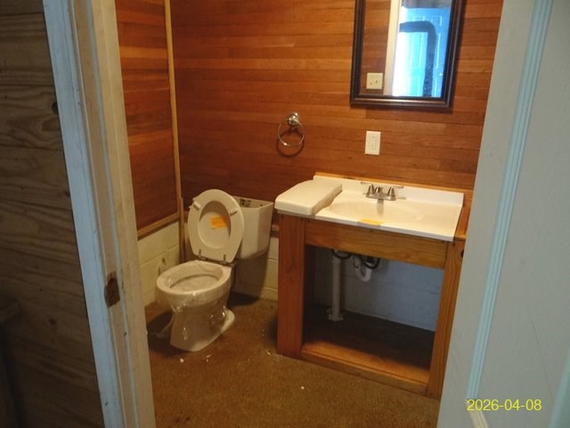 144 Old Sardis Church Road Clayton, AL 36016 - Photo 26 of 34 a bathroom with a toilet sink and mirror