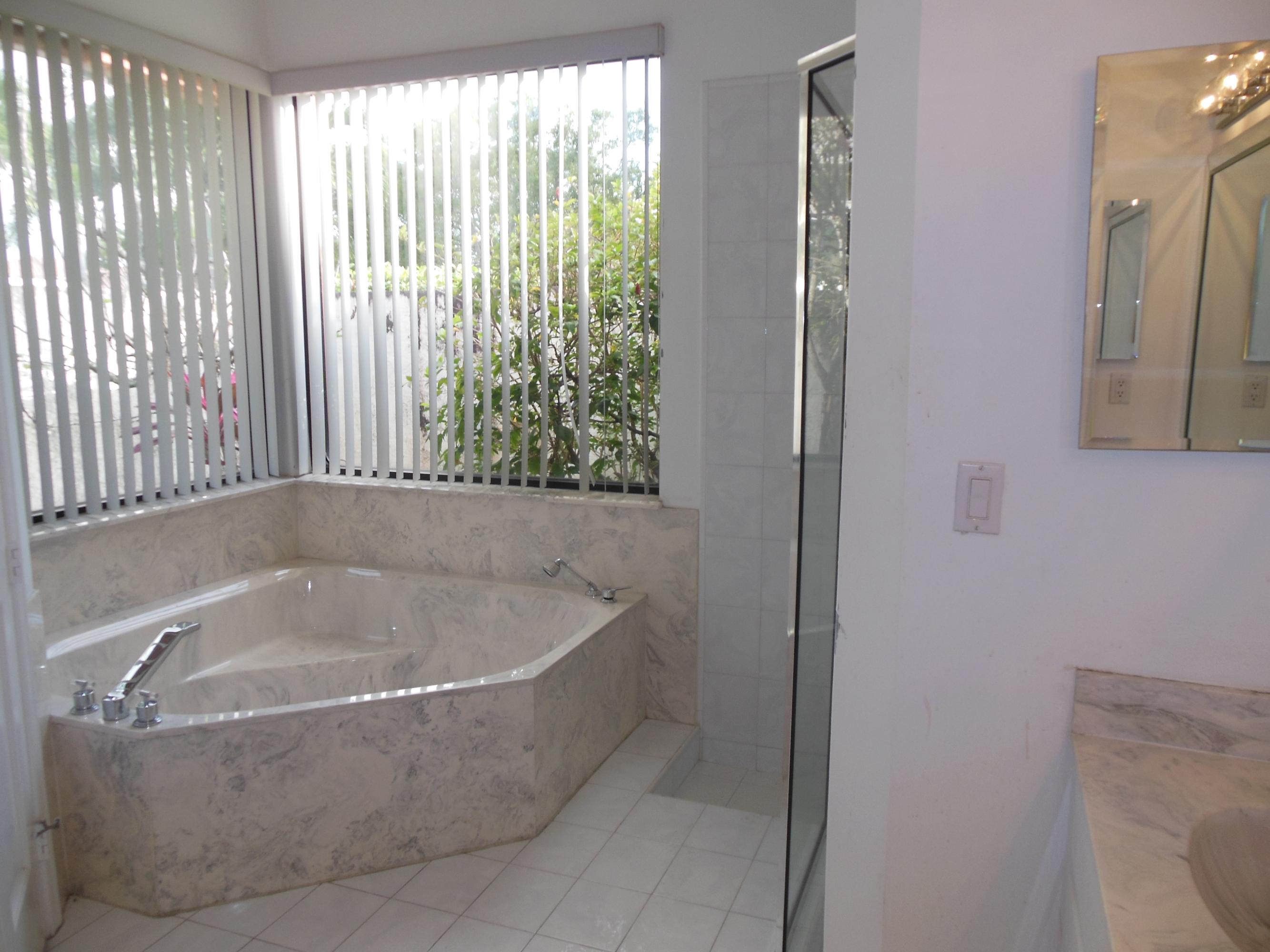 2771 Northwest 49th Street Boca Raton, FL 33434 - Photo 11 of 32 Master Roman Tub