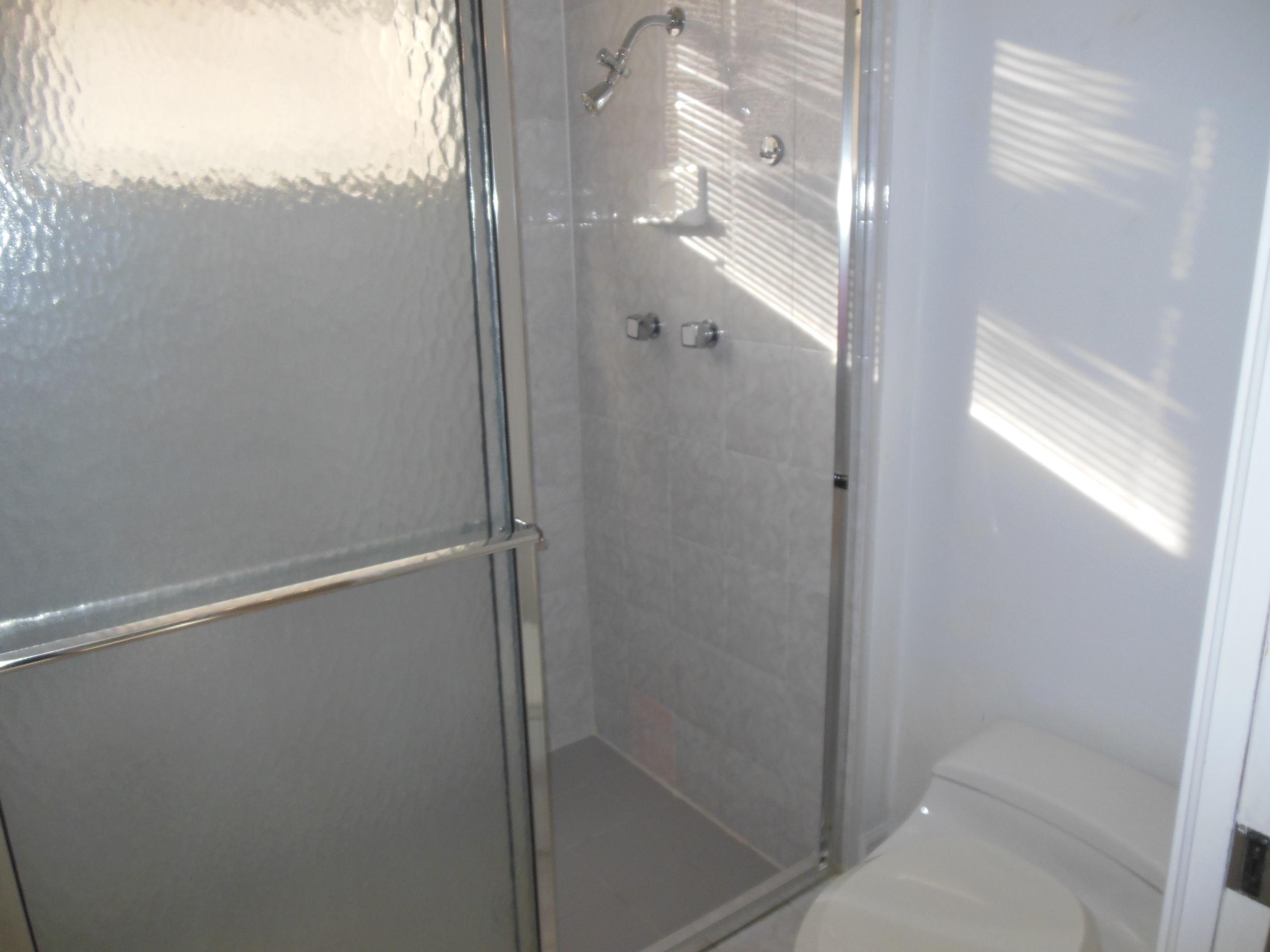 2771 Northwest 49th Street Boca Raton, FL 33434 - Photo 19 of 32 Jack n Jill Shower