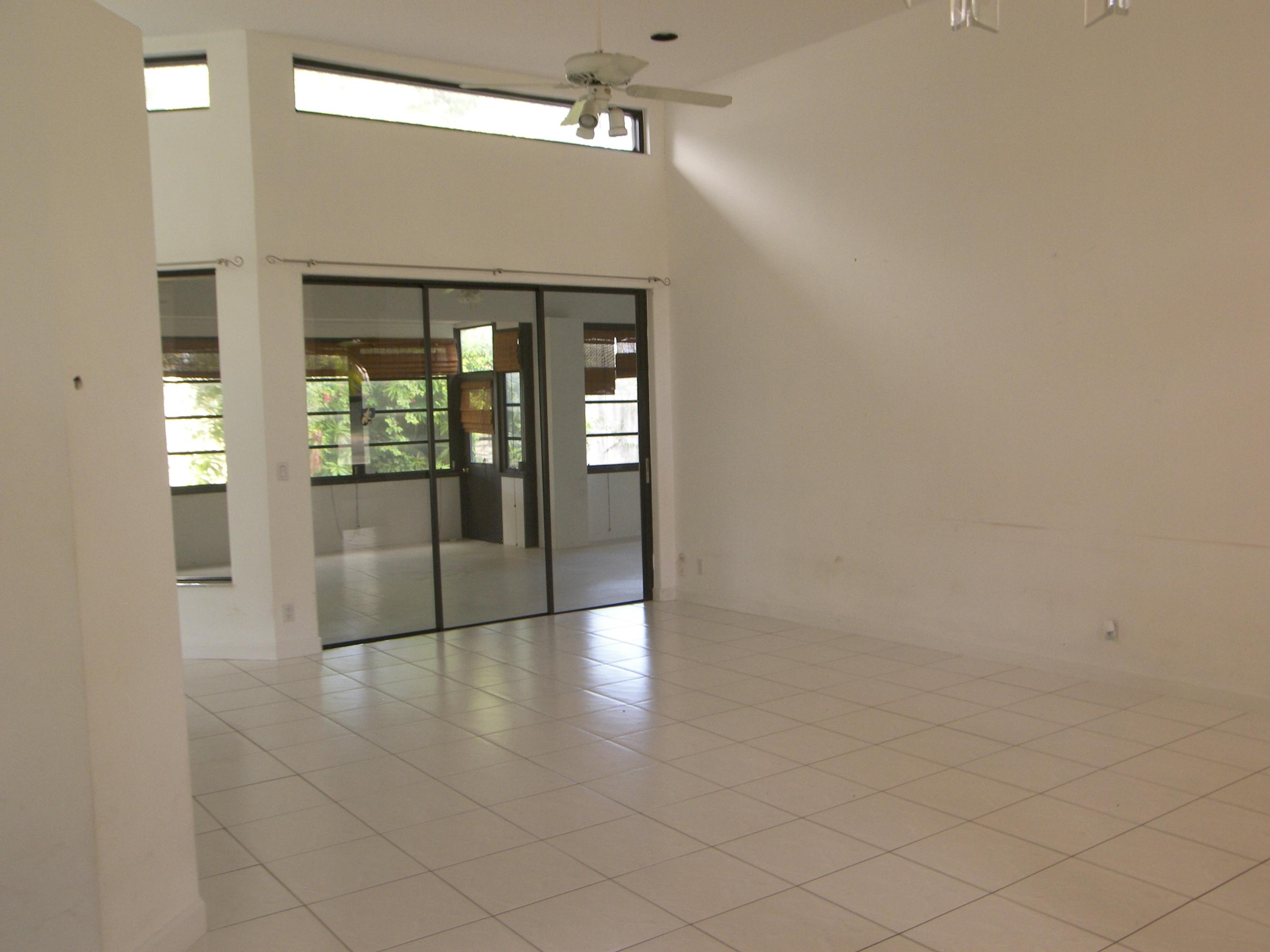 2771 Northwest 49th Street Boca Raton, FL 33434 - Photo 7 of 32 Formal Living Room w/clerestory glass