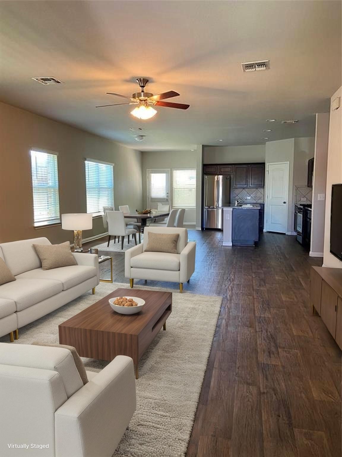 2217 Baugh Road Austin, TX 78754 - Photo 4 of 15 Living area featuring dark wood-type flooring and ceiling fan