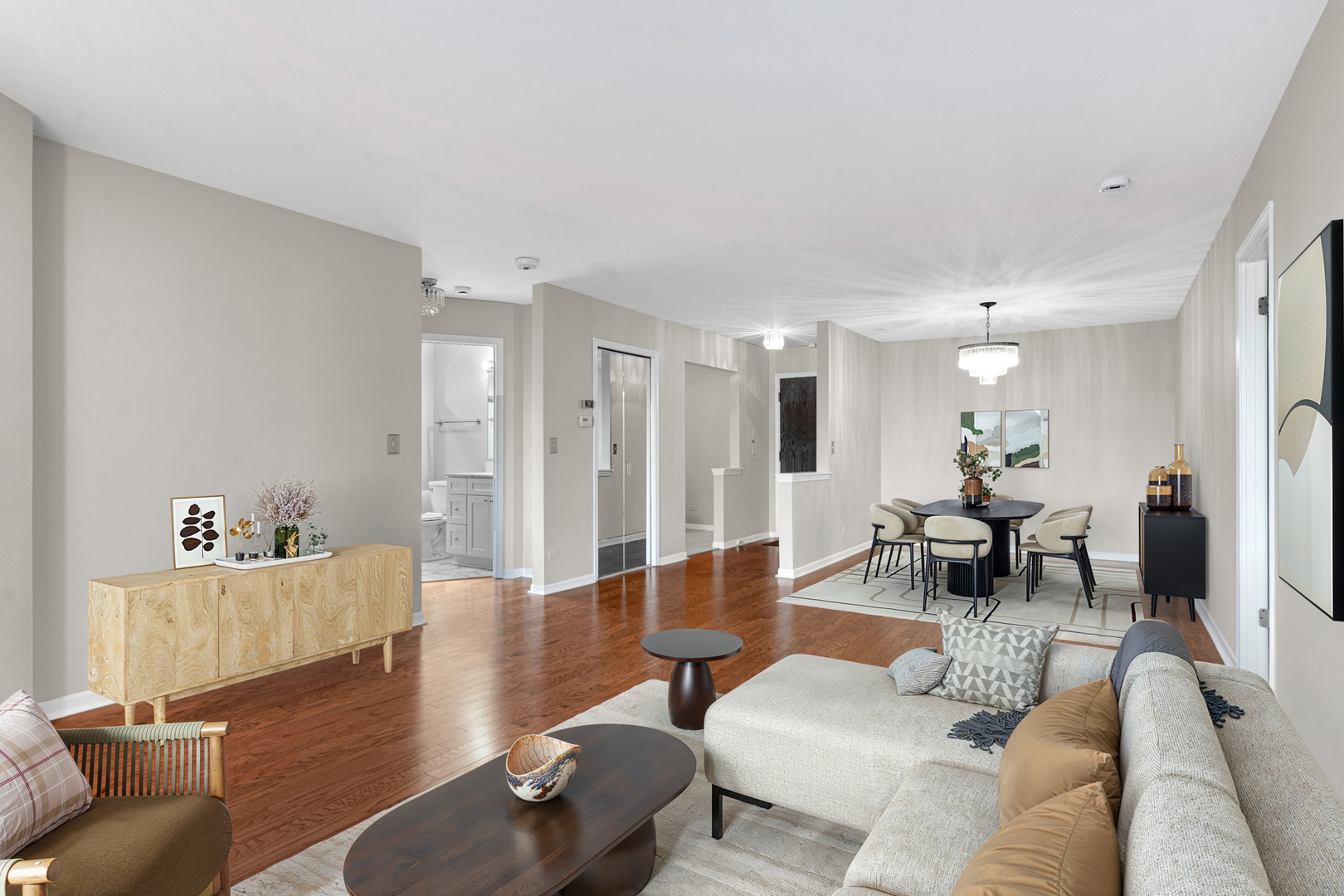 400 East Dundee Road, Unit 408 Buffalo Grove, IL 60089 - Photo 6 of 24 a living room with furniture and a wooden floor