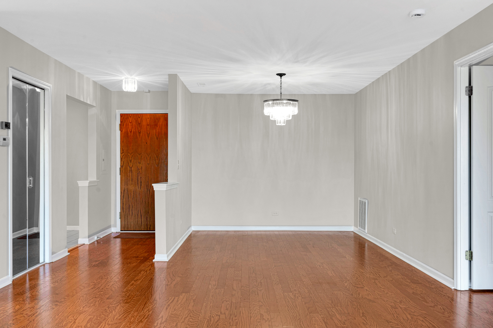 400 East Dundee Road, Unit 408 Buffalo Grove, IL 60089 - Photo 9 of 24 a view of empty room with wooden floor