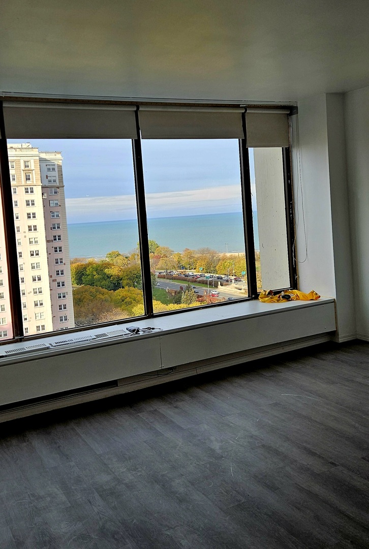 5455 North Sheridan Road, Unit 1807 Chicago, IL 60640 - Photo 4 of 10 a view of a floor to ceiling window in an empty room