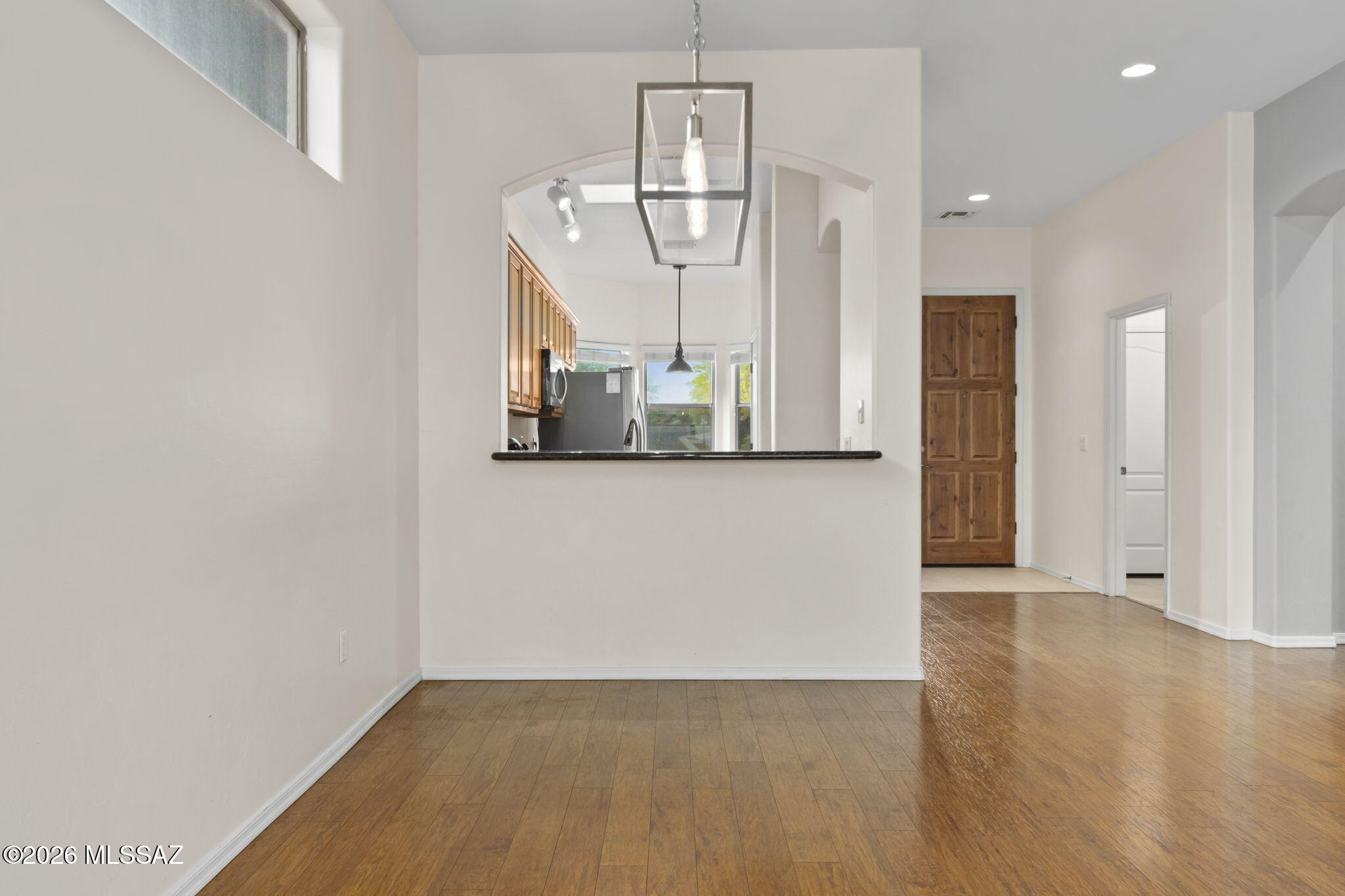 13668 East High Plains Ranch Street Vail, AZ 85641 - Photo 21 of 51 a view of a hallway with wooden floor and entryway
