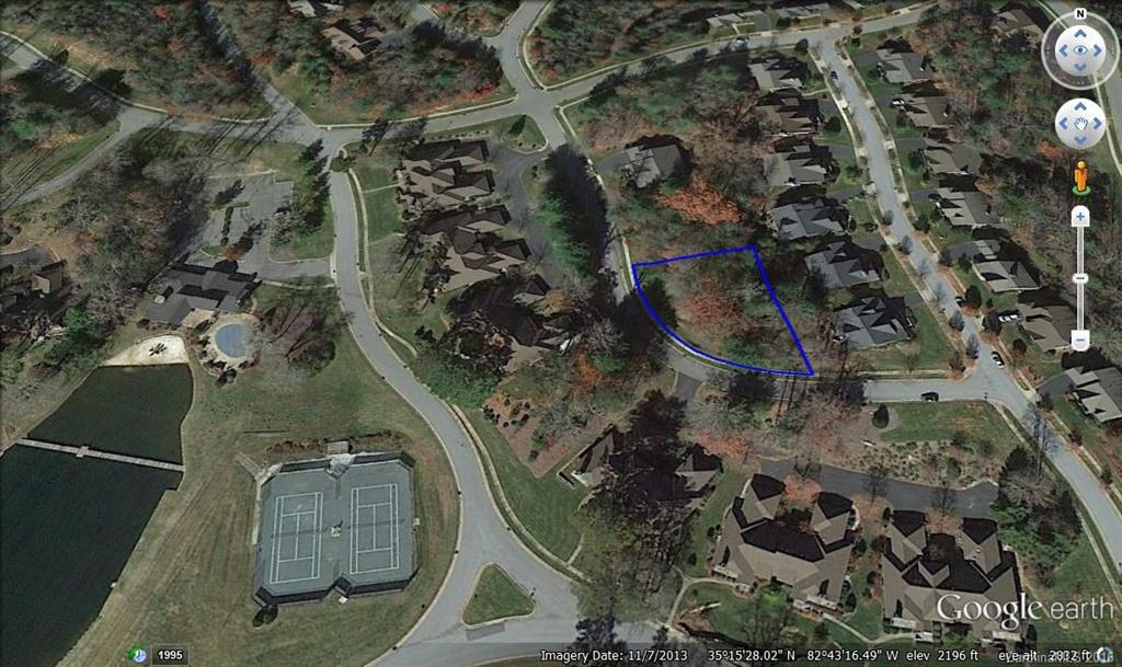 V26 Camp Sapphire Road Brevard, NC 28712 - Photo 9 of 21 an aerial view of a house with a yard
