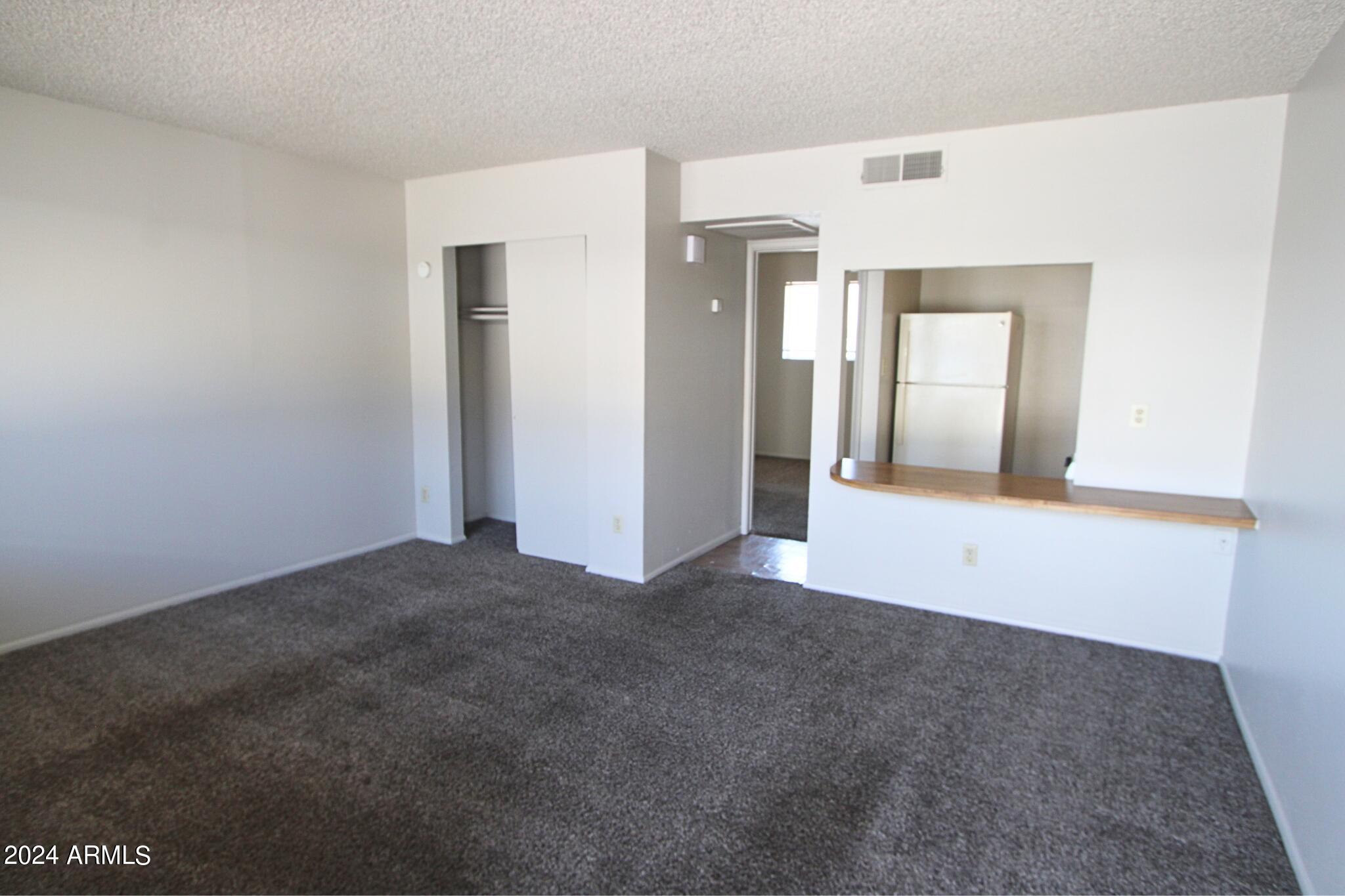 9230 North 6th Street, Unit 2 Phoenix, AZ 85020 - Photo 3 of 11 a view of an empty room