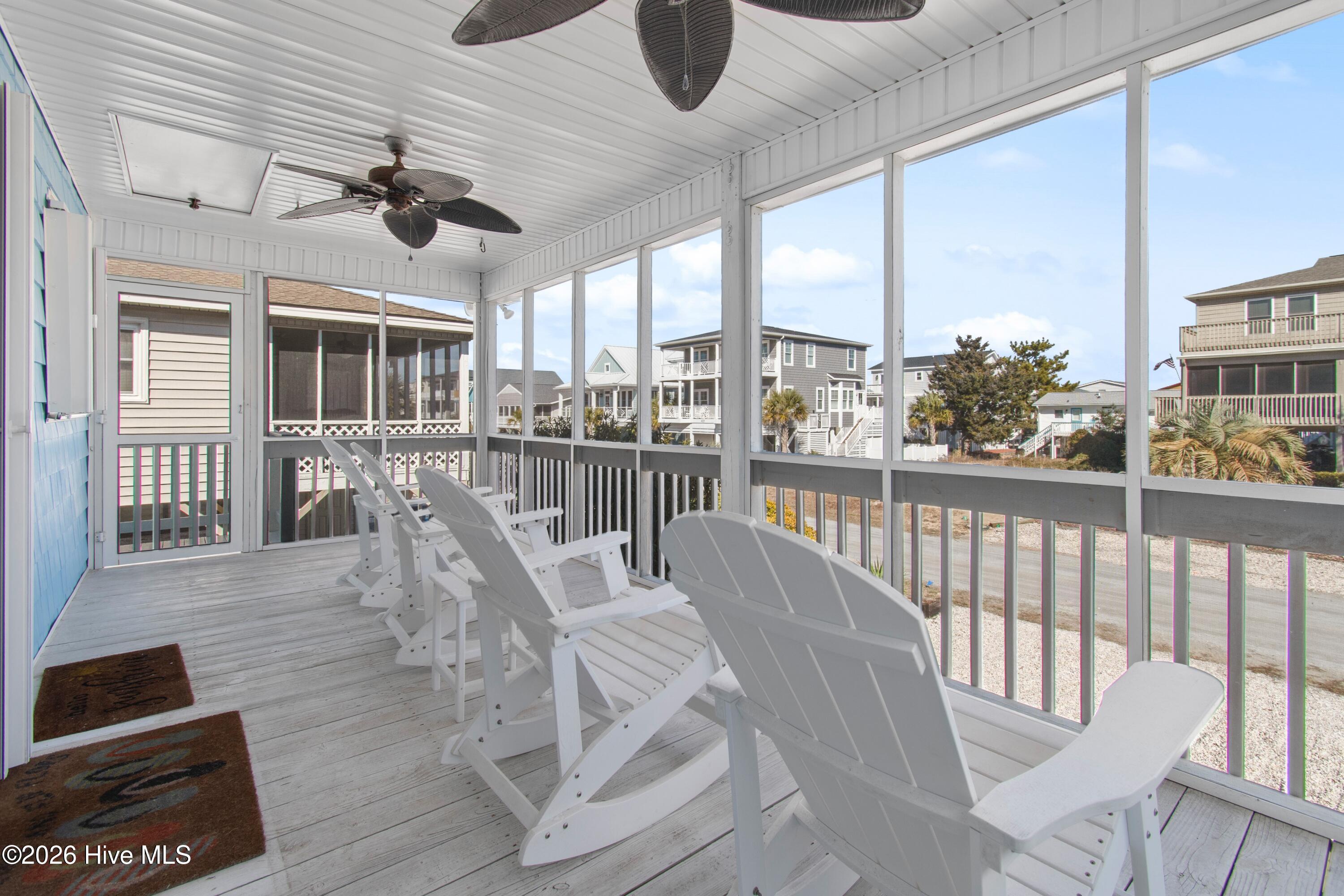 430 3rd Street Sunset Beach, NC 28468 - Photo 12 of 49 Shady area on this screened front porch