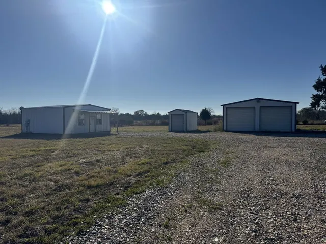 a view of a lake in middle of the house