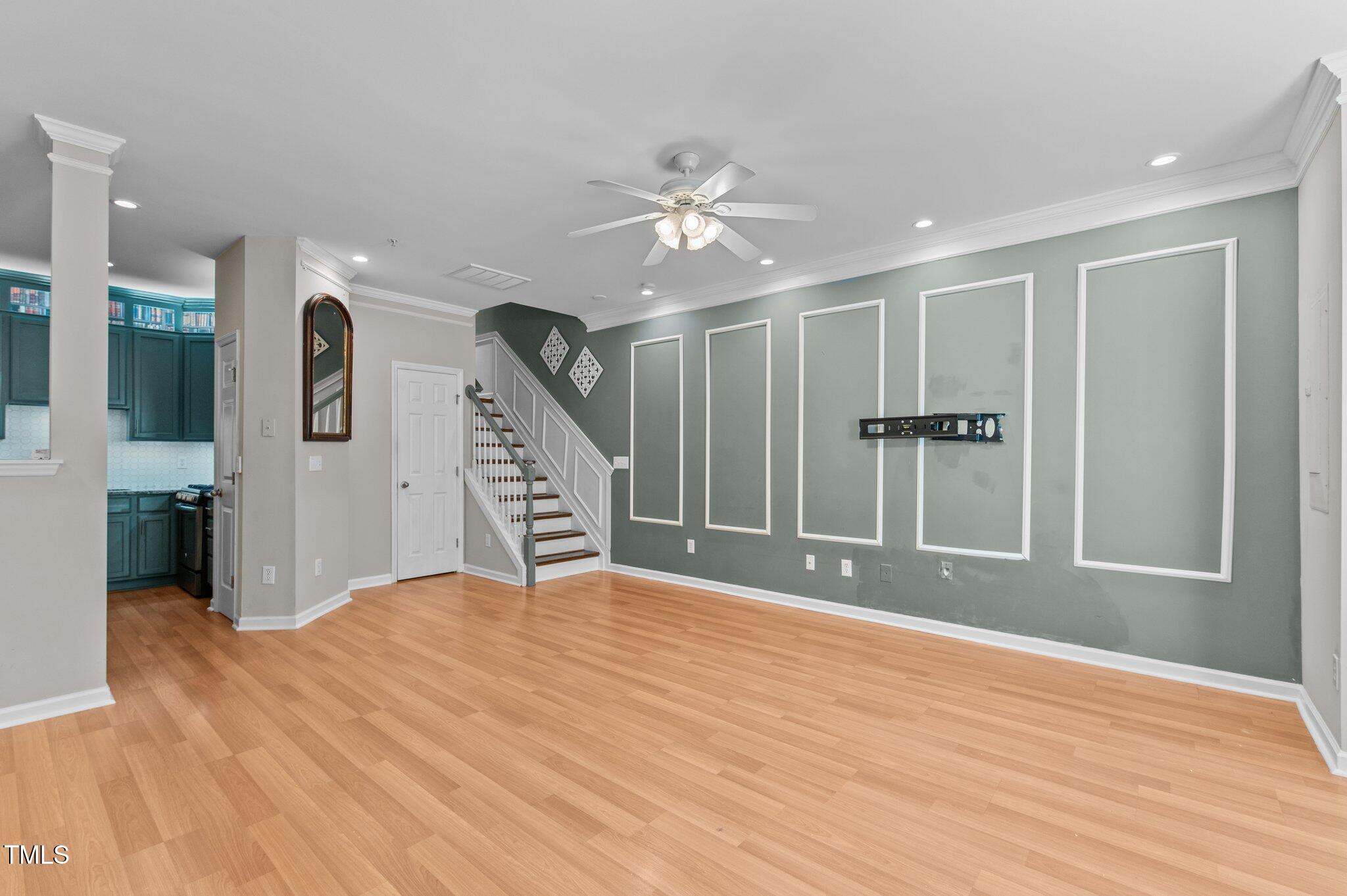 2210 Raven Road, Unit 105 Raleigh, NC 27614 - Photo 3 of 26 a view of empty room with wooden floor