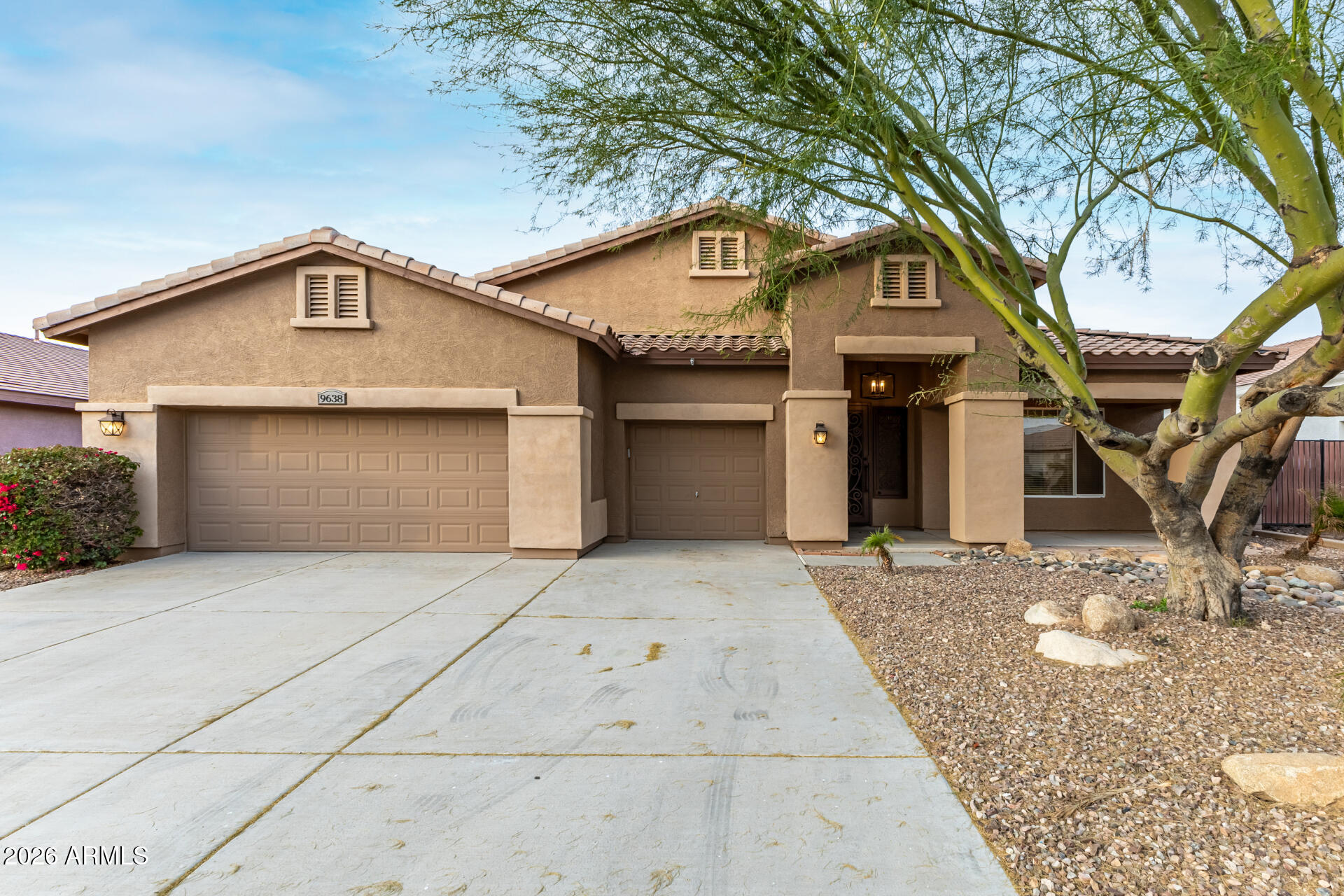 9638 West Bajada Road Peoria, AZ 85383 - Photo 1 of 26 a front view of a house with yard