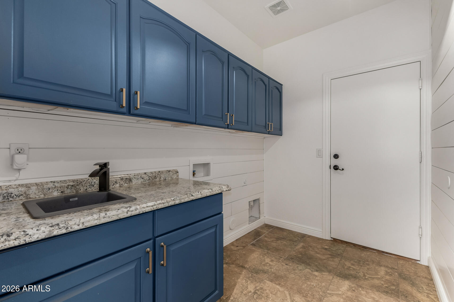 9638 West Bajada Road Peoria, AZ 85383 - Photo 21 of 26 a kitchen with a sink and cabinets