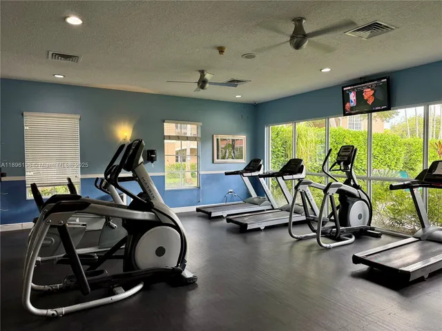 a view of a room with gym equipment