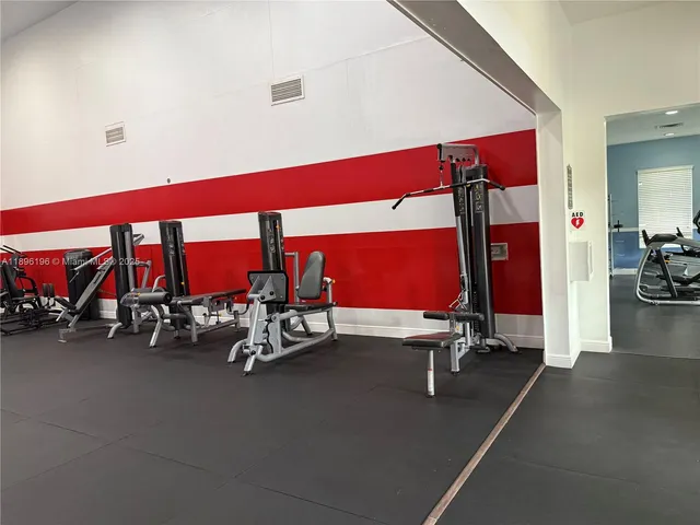 a view of a room with gym equipment