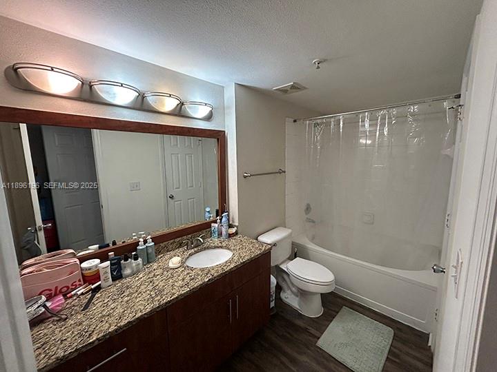 11601 Southwest 2nd Street, Unit 21301 Pembroke Pines, FL 33025 - Photo 7 of 21 a bathroom with a granite countertop sink toilet and shower