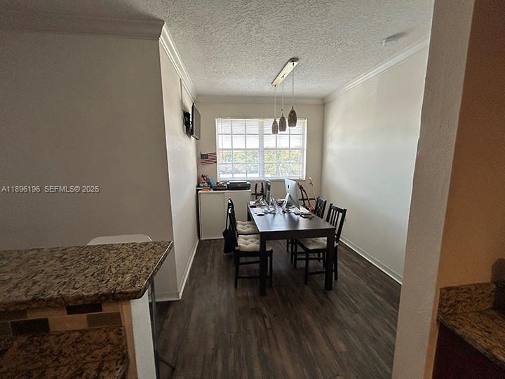 11601 Southwest 2nd Street, Unit 21301 Pembroke Pines, FL 33025 - Photo 8 of 21 a view of a dining room with furniture and wooden floor
