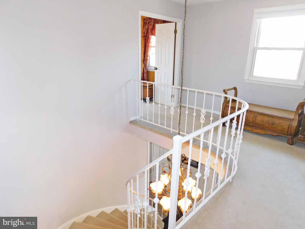 123 Signal Hill Road Holland, PA 18966 - Photo 19 of 38 Circular stairs leading to Landing