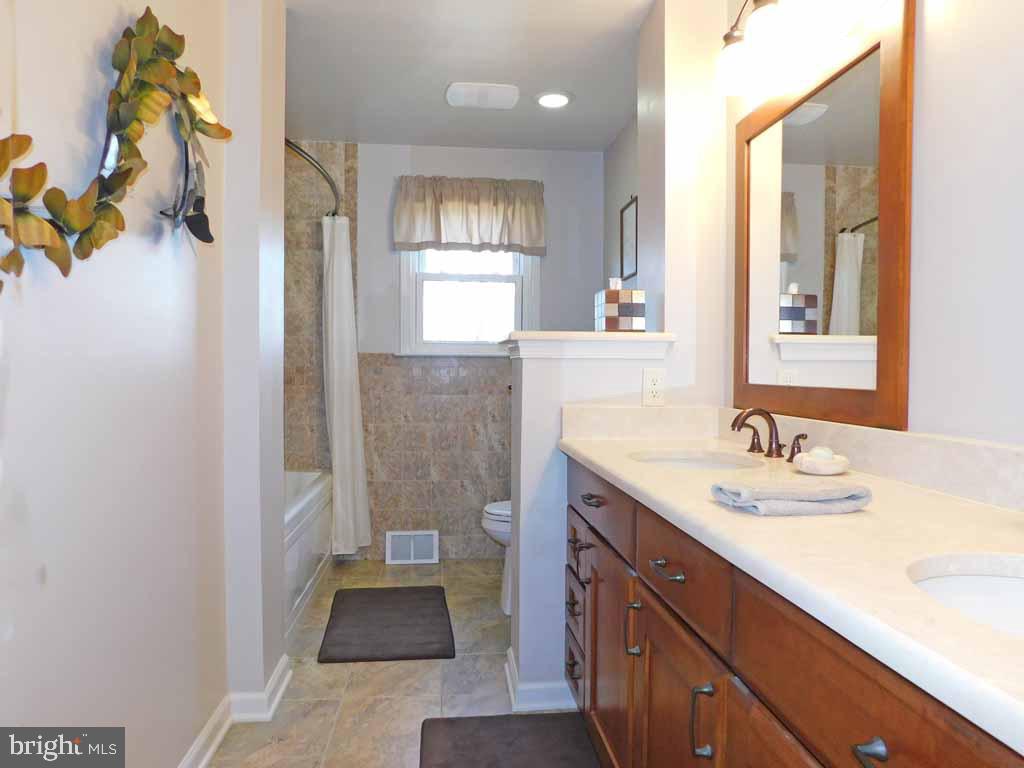 123 Signal Hill Road Holland, PA 18966 - Photo 29 of 38 Remodeled Hall Bath
