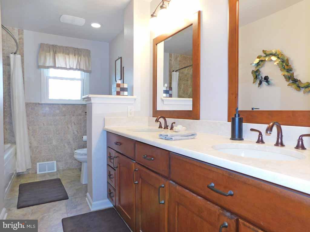 123 Signal Hill Road Holland, PA 18966 - Photo 30 of 38 Remodeled Hall Bath