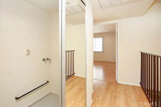 a view of a bathroom from a hallway