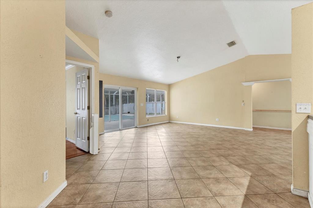 11619 Summit Rock Court Parrish, FL 34219 - Photo 12 of 36 a view of an empty room with a window