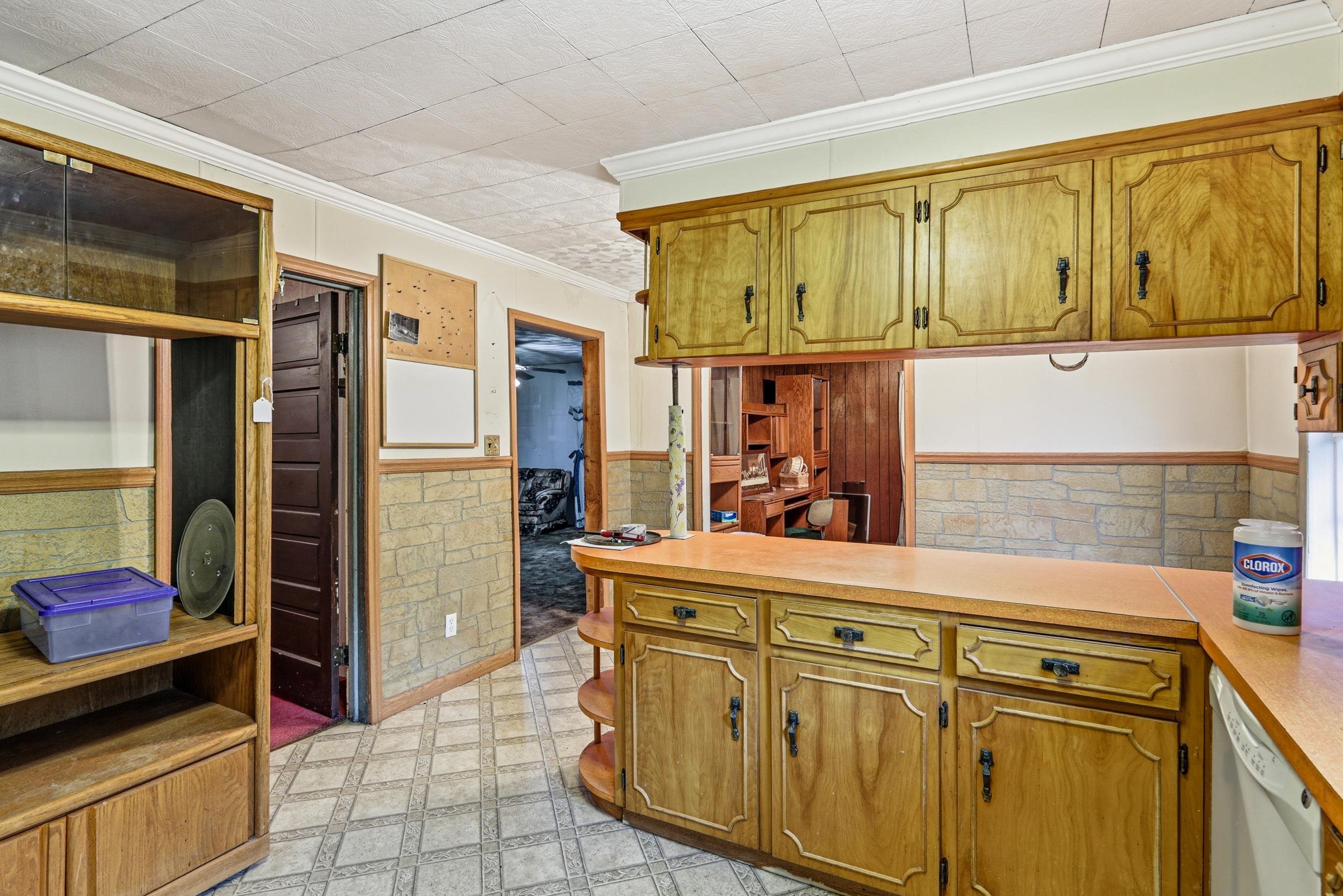13896 Rockingham Pike Elkton, VA 22827 - Photo 24 of 60 a kitchen with stainless steel appliances granite countertop a sink and cabinets