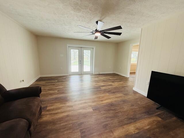 541 South Brocksmith Road Fort Pierce, FL 34945 - Photo 11 of 36 a view of an empty room with window and wooden floor