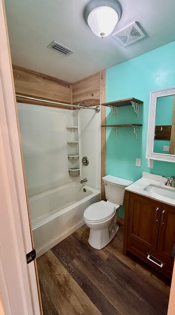 541 South Brocksmith Road Fort Pierce, FL 34945 - Photo 15 of 36 a bathroom with a sink toilet and shower