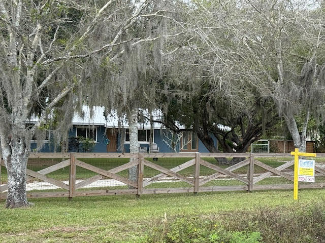 541 South Brocksmith Road Fort Pierce, FL 34945 - Photo 2 of 36 a view of a house with backyard