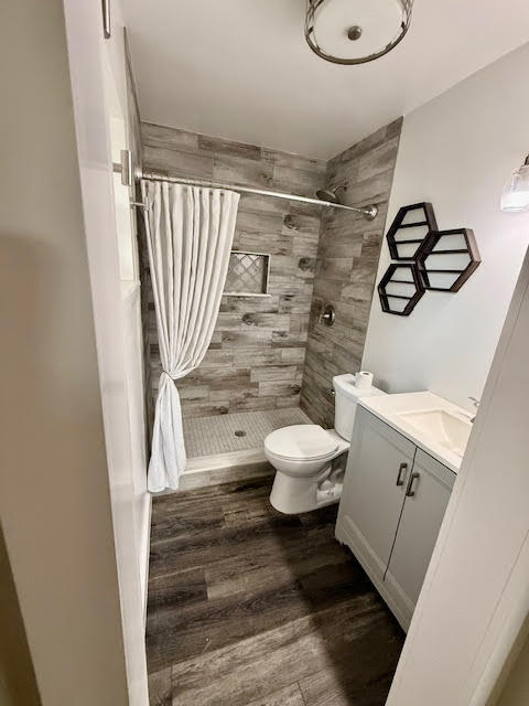 541 South Brocksmith Road Fort Pierce, FL 34945 - Photo 23 of 36 a bathroom with a toilet and a shower