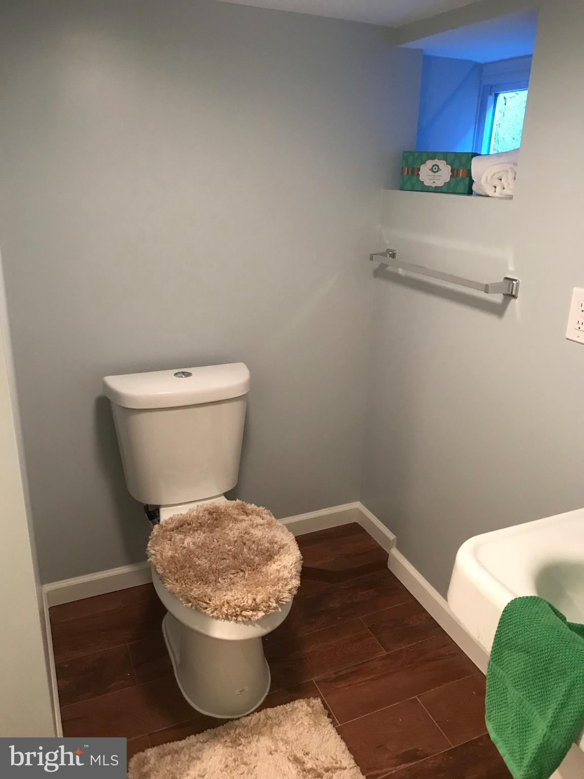 103 South Tremont Road Baltimore, MD 21229 - Photo 19 of 20 Basement Full bath