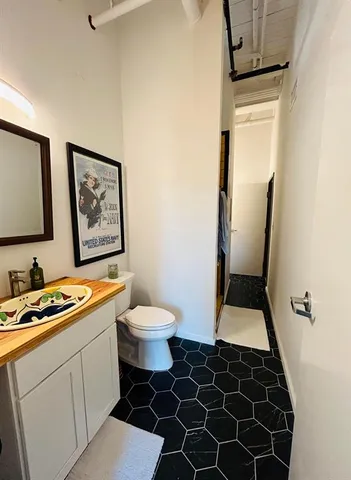 a room with a bed and a window