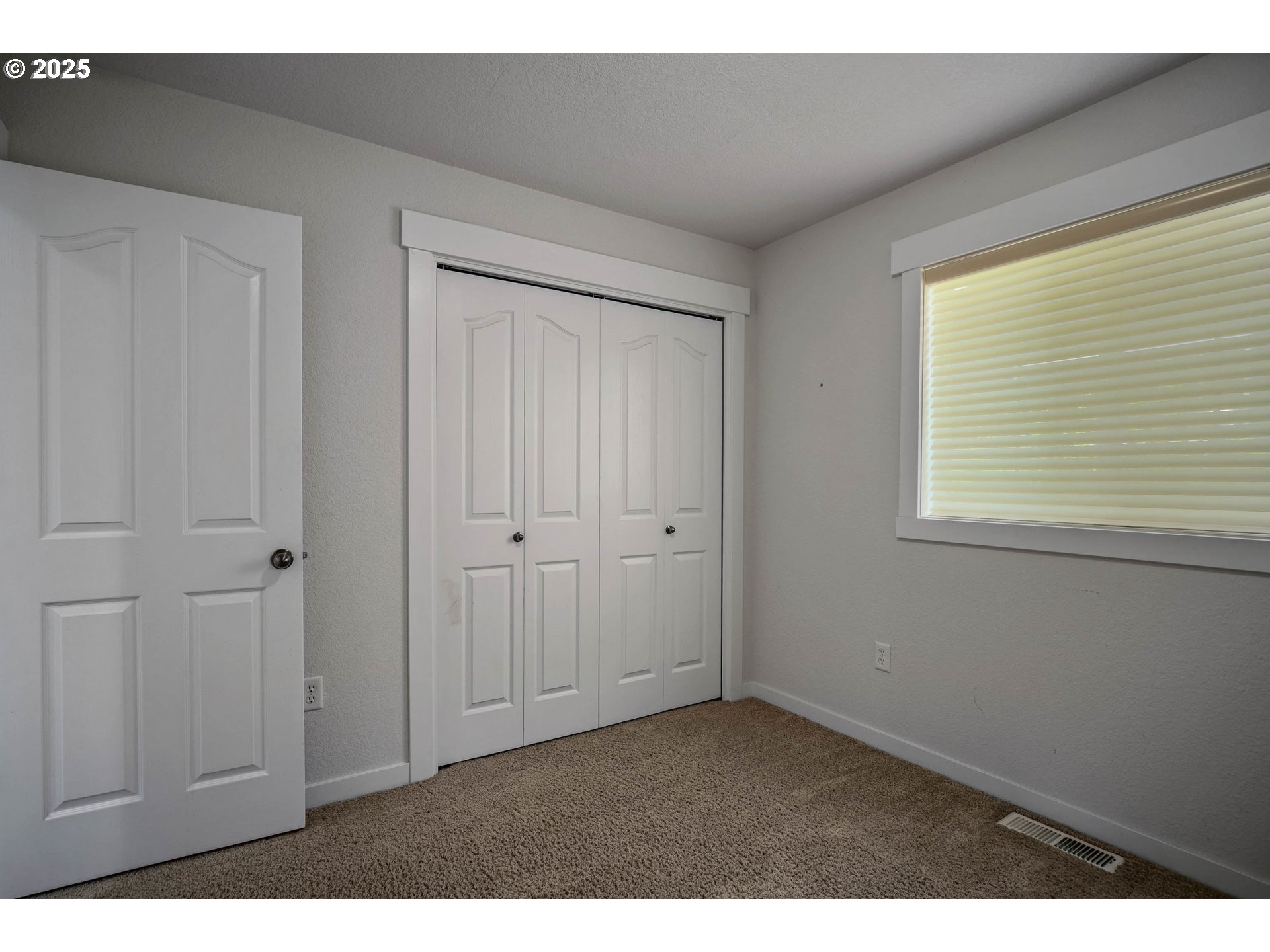 1897 Northeast Lucy Belle Street McMinnville, OR 97128 - Photo 31 of 39 a view of an empty room with a window