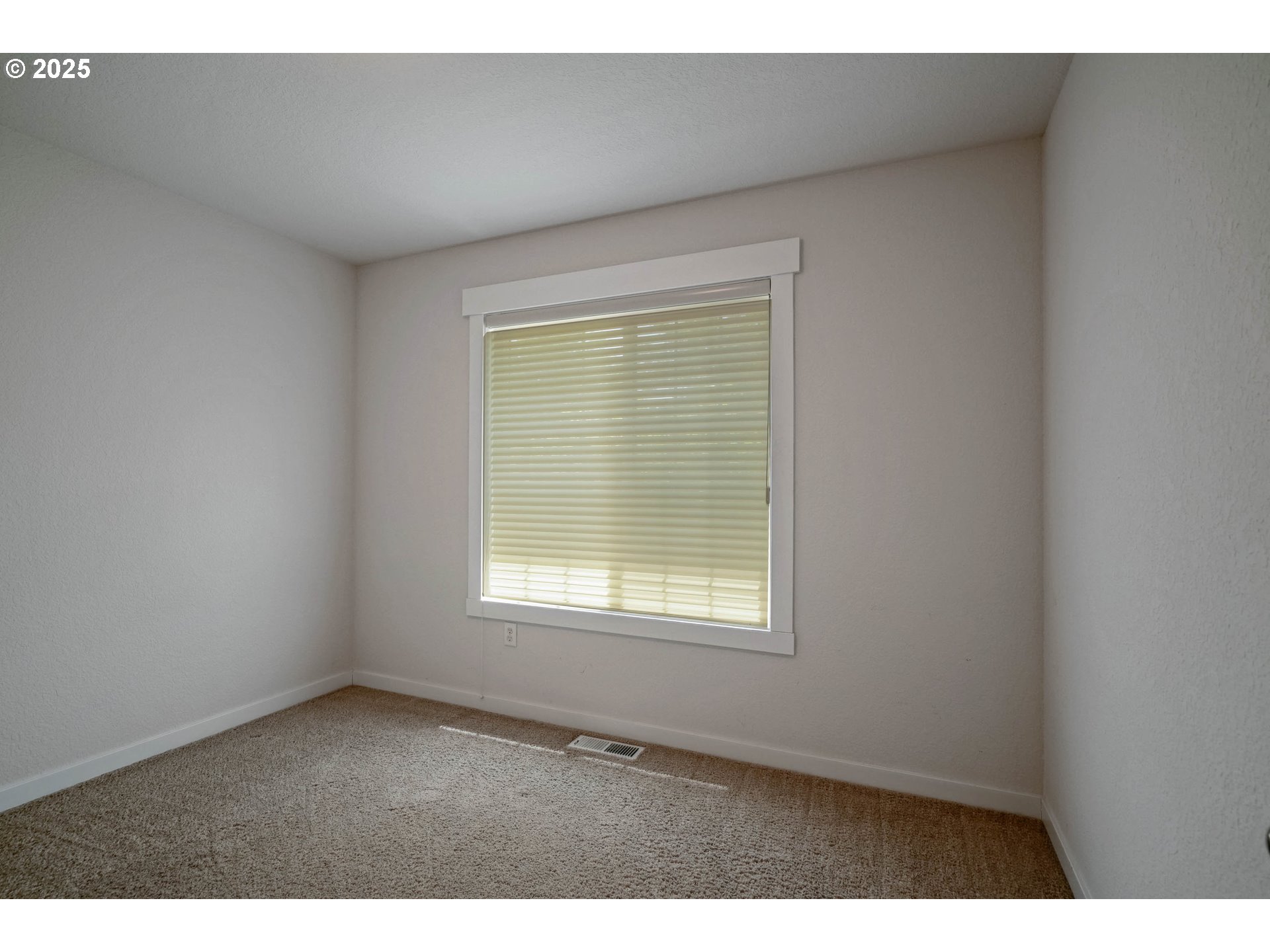 1897 Northeast Lucy Belle Street McMinnville, OR 97128 - Photo 34 of 39 a view of an empty room with a window