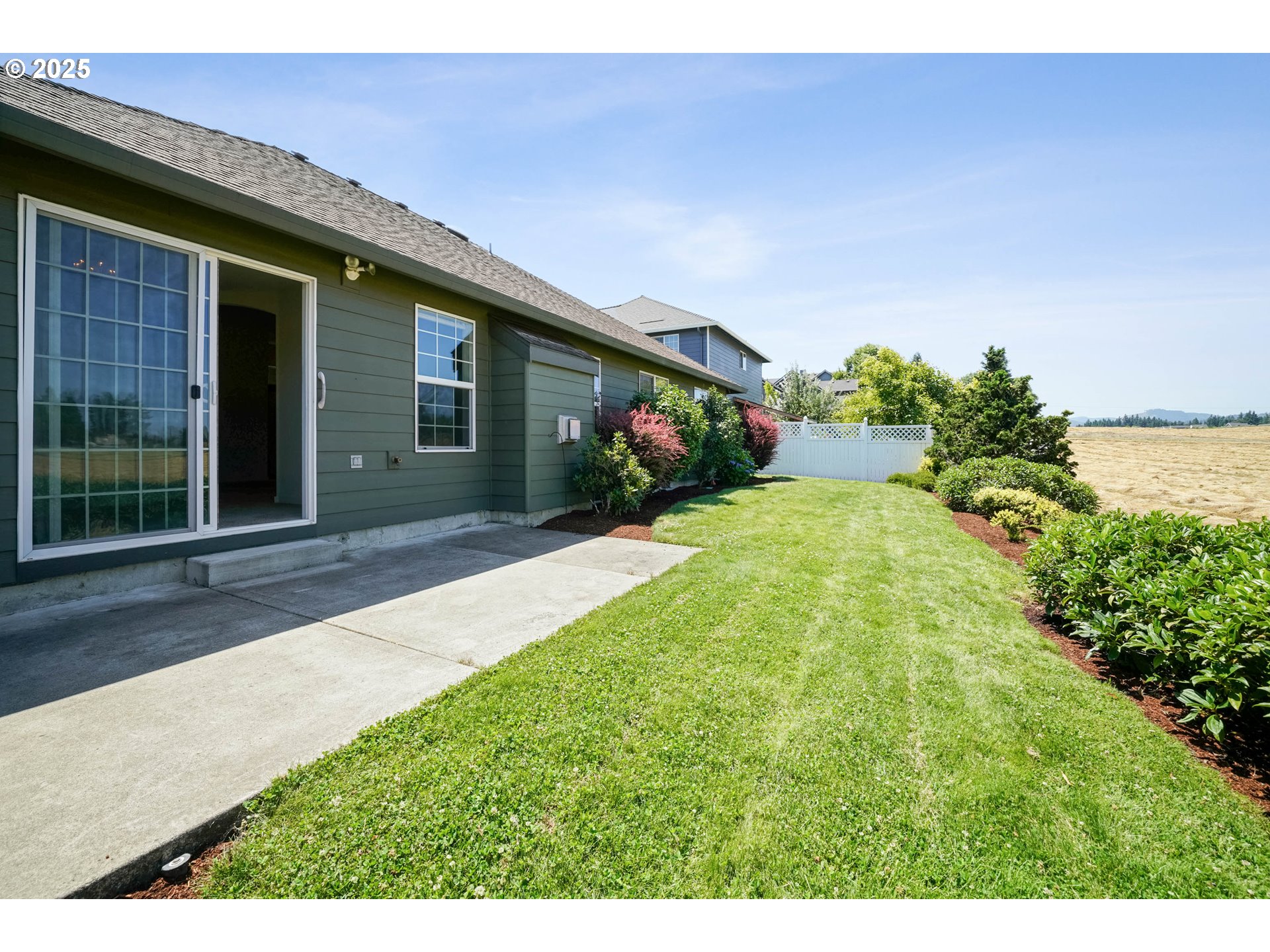 1897 Northeast Lucy Belle Street McMinnville, OR 97128 - Photo 36 of 39 a view of a house with backyard and porch