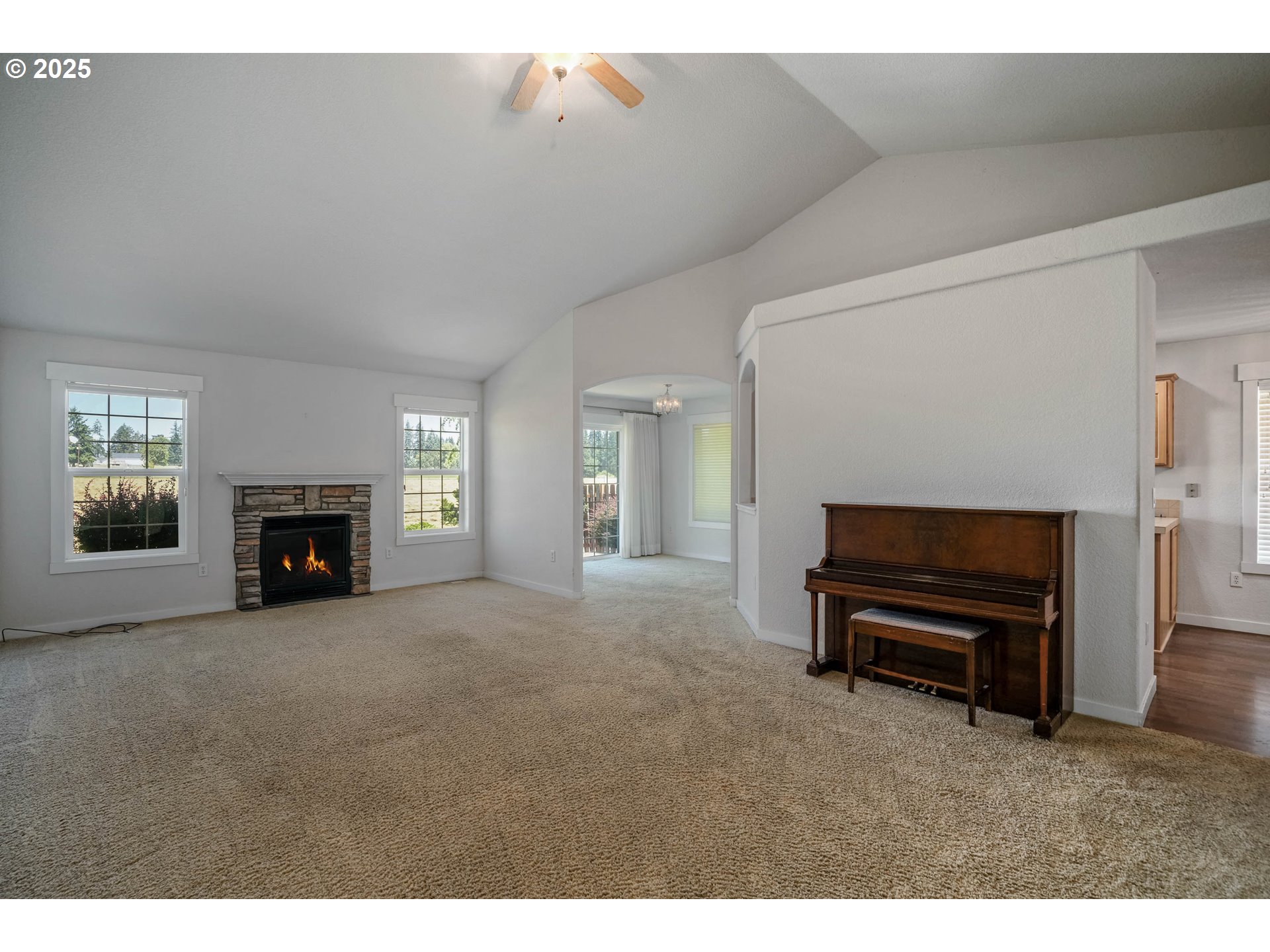 1897 Northeast Lucy Belle Street McMinnville, OR 97128 - Photo 10 of 39 a view of a livingroom with furniture and a fireplace