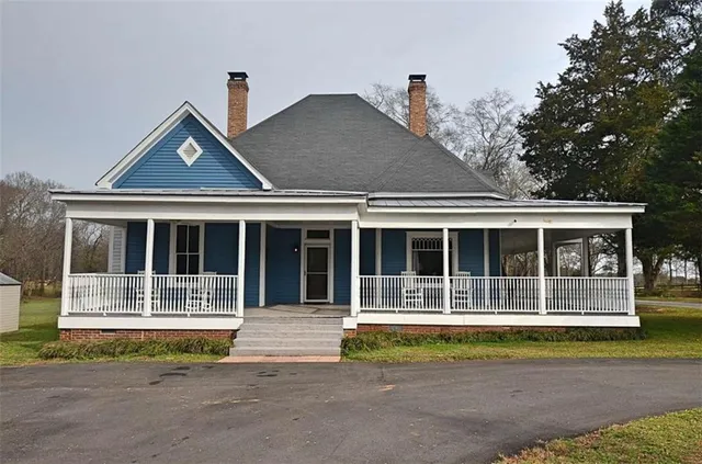a house view with a garden space