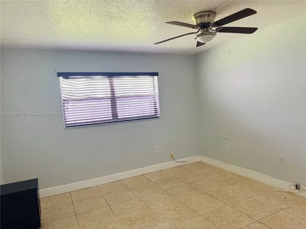 a view of a room with a window
