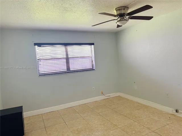 a view of a room with a window