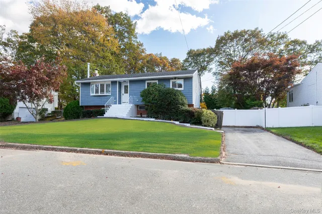 a house view with a garden space