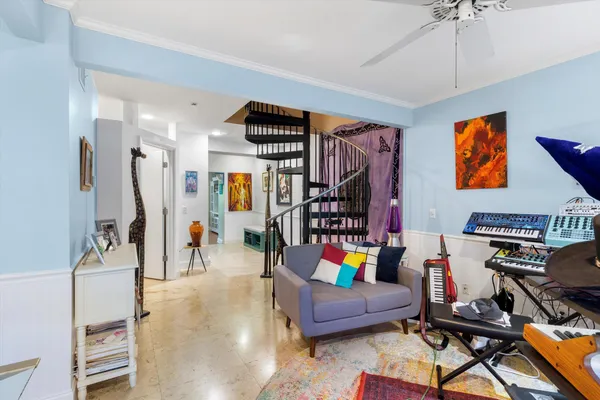 a living room with furniture and rug