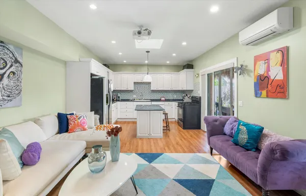 a living room with furniture and a couch