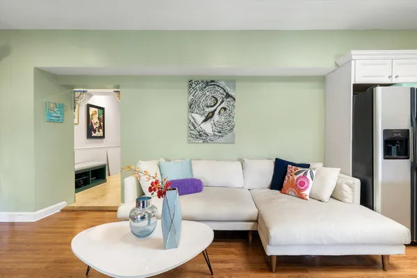 a bedroom with furniture and a book shelf