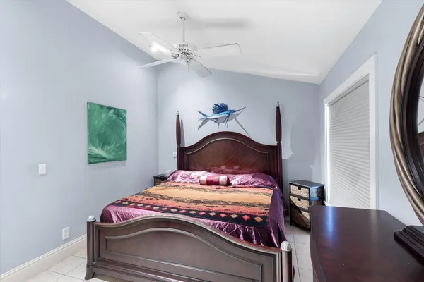 a picture of a bench in front of a wall