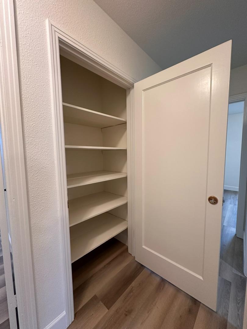 1220 Church Street Lodi, CA 95240 - Photo 14 of 31 a view of walk in closet with empty racks