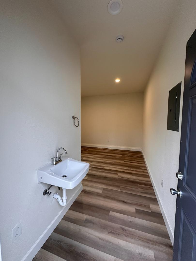 1220 Church Street Lodi, CA 95240 - Photo 27 of 31 a bathroom with a sink and mirror