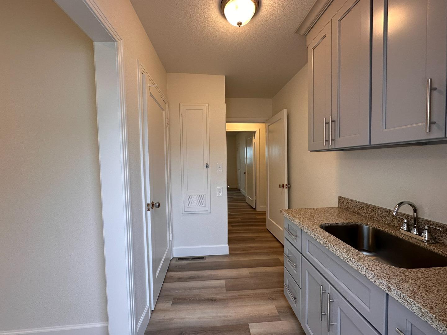 1220 Church Street Lodi, CA 95240 - Photo 9 of 31 a kitchen with sink and cabinets